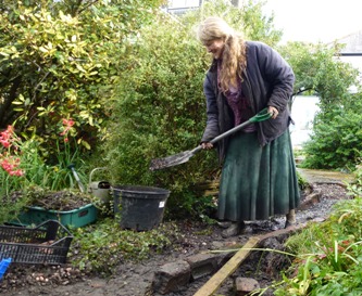 Re-routing (and lifting the height of) a gravel path to enhance border viewing